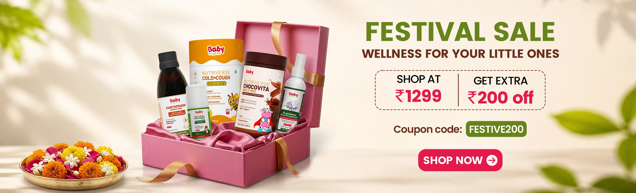 BabyOrgano Festival Sale promotional banner offering extra RS 200 off on orders above RS 1299 using coupon code FESTIVE200 with kids Ayurvedic wellness gift box
