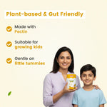 Mother and son holding BabyOrgano bottle - Plant-based pectin formula that is gentle on little tummies and suitable for growing kids | #flavour_mango