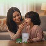 Mother giving BabyOrgano Nutriverse Immunity Gummies to her daughter for kids wellness and stronger immunity